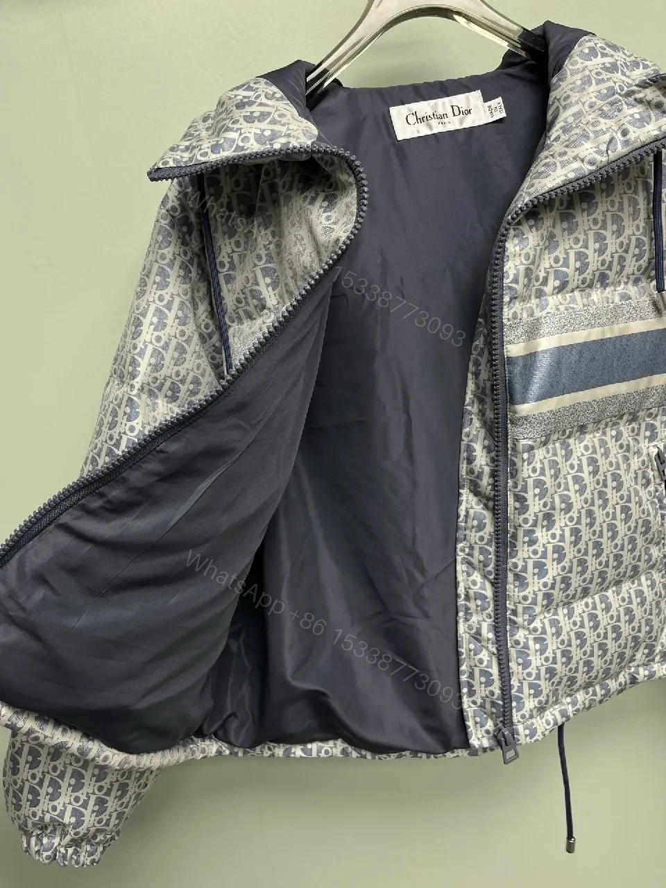 View 7 of Monochrome Puffer Jacket: Monogram Texture, Modern Warmth, Street-Ready Outerwear
