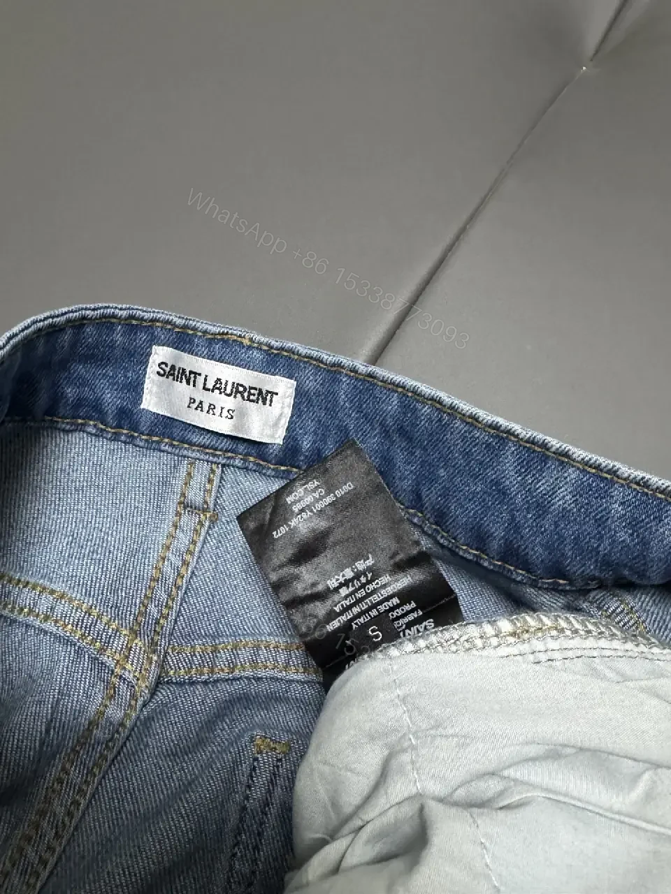 View 9 of Chic Distressed Couture: Wide-Leg Jeans with Emblems