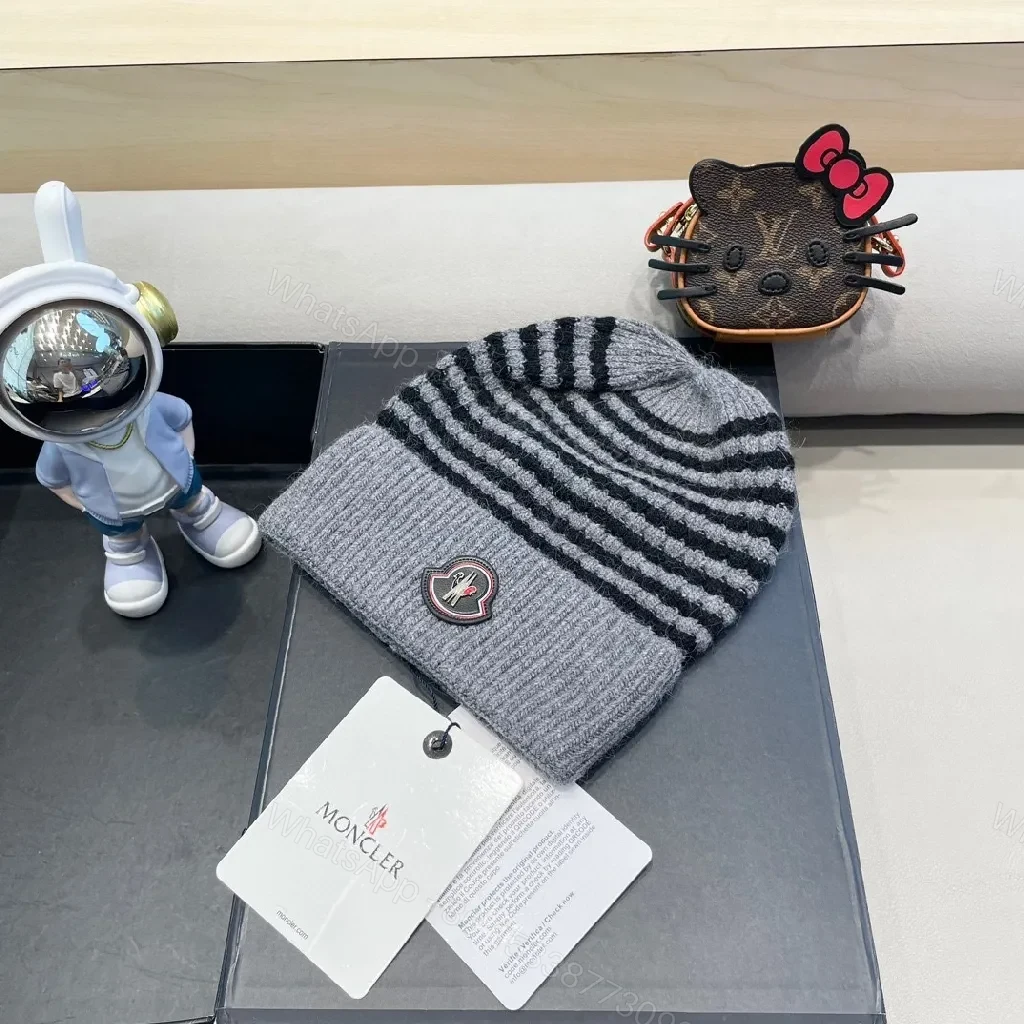 View 9 of Cozy Striped Knit Beanie with Moncler Badge - Luxe Warmth
