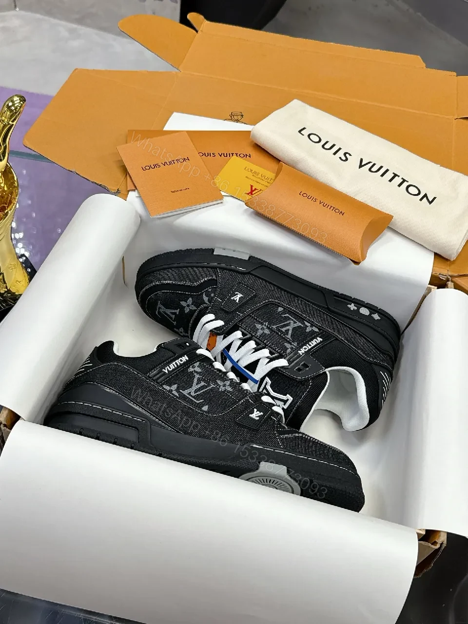 View 8 of Bold Black Denim-Textured Sneakers with LV Monogram