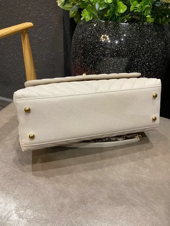 View 3 of White Quilted Luxury Bag with Gold Logo â€“ Chic Everyday Elegance