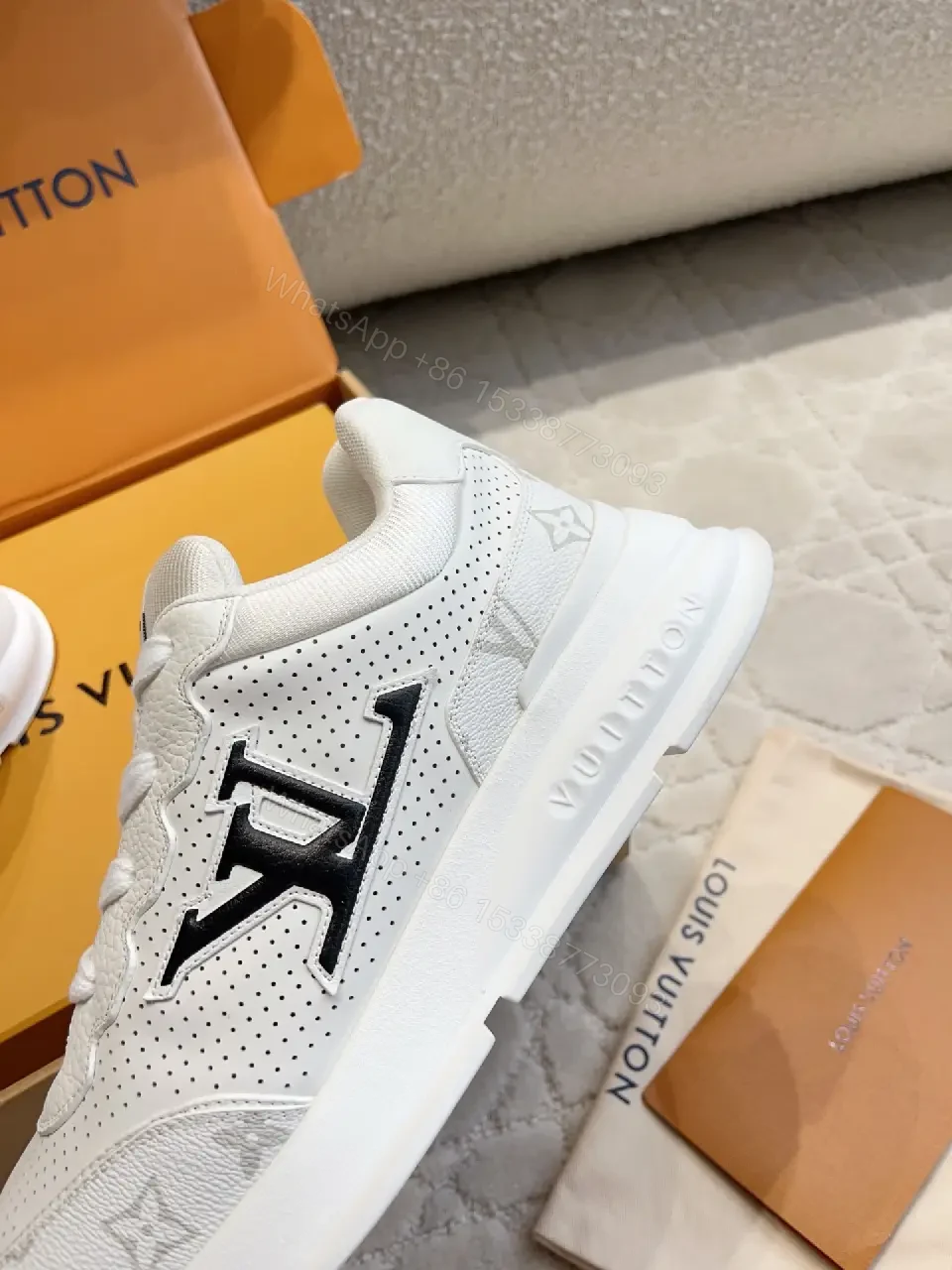 View 6 of White Leather Runner Sneakers Perforated Mesh Modern LV Logo Accent Shoes