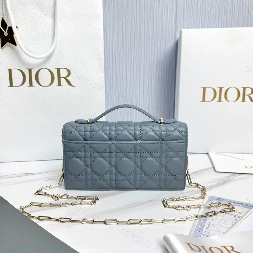 View 4 of Muted Blue-Gray Quilted Crossbody with Bow Charm, Luxe Everyday
