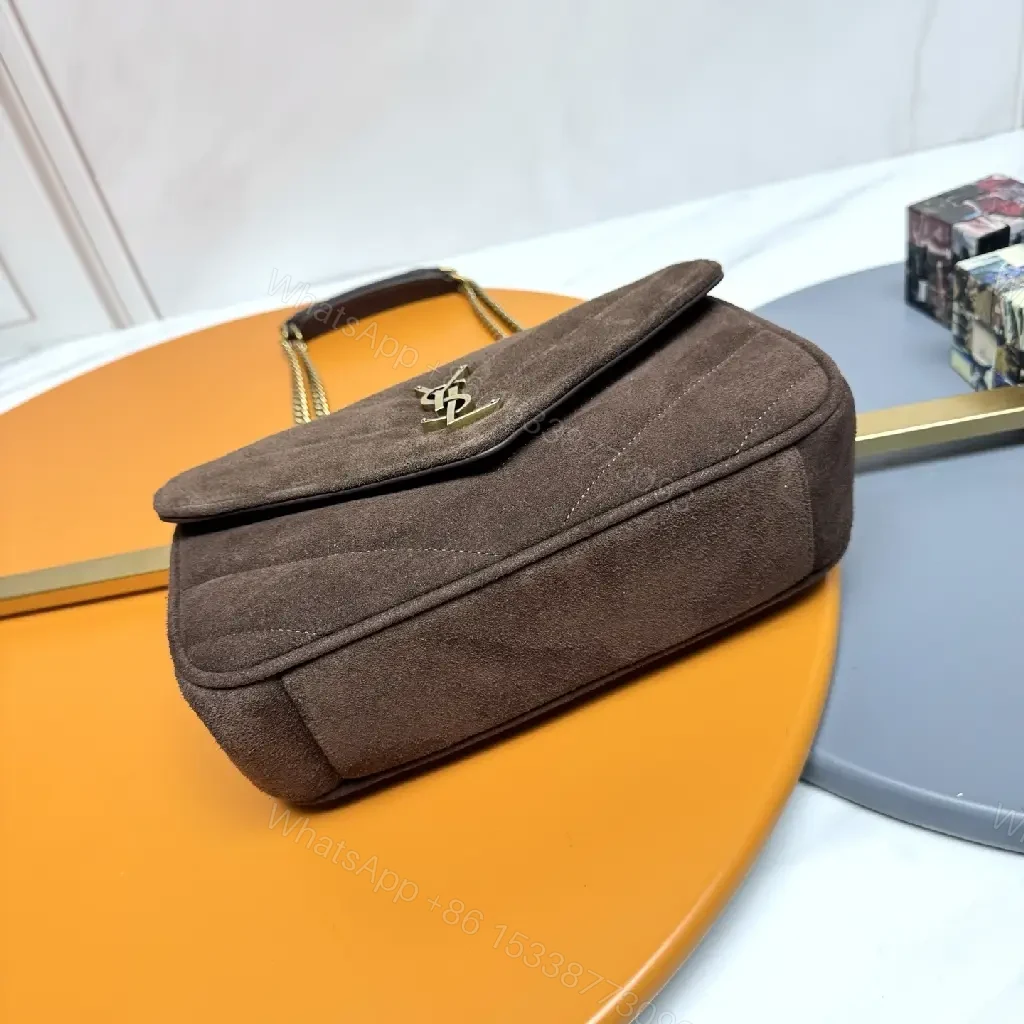 View 5 of Compact Suede Shoulder Bag with Gold Emblem - Textured Chic Everyday Luxury
