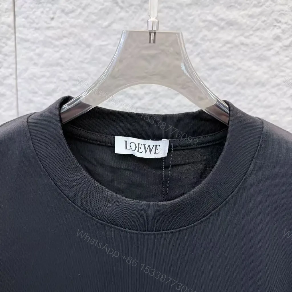 View 7 of Bold Embellished Tee: Black Cotton, Relaxed Fit, Multicolor Embroidery
