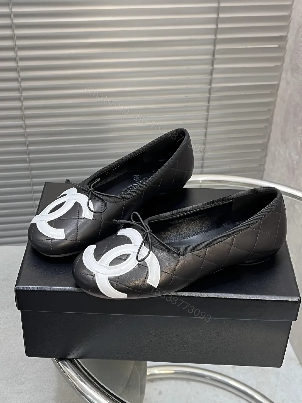 Quilted Leather Ballet Flats with Logo Detail — view 1