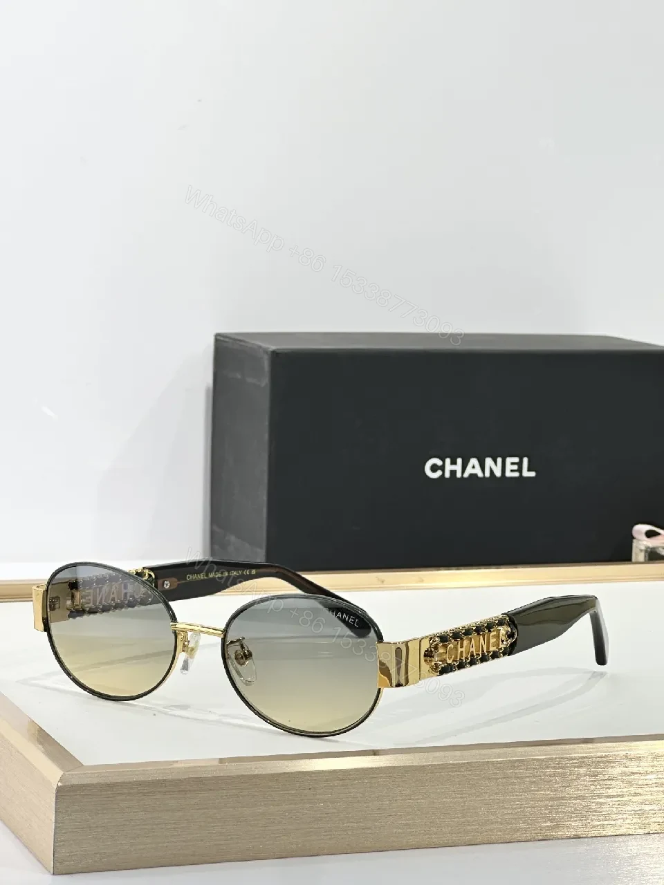Gold-Accented Round Sunglasses: Minimal Luxury Shield — view 1