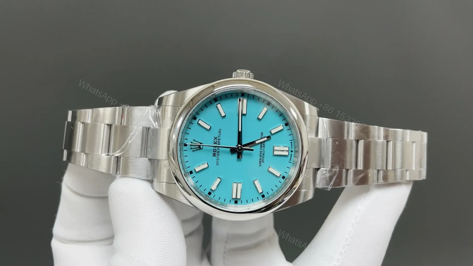View 2 of Rolex Oyster Perpetual 41 124300 Turquoise Dial Watch 124300-006