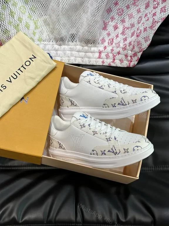 View 3 of Louis Vuitton-Style White Leather Sneakers with Signature Details
