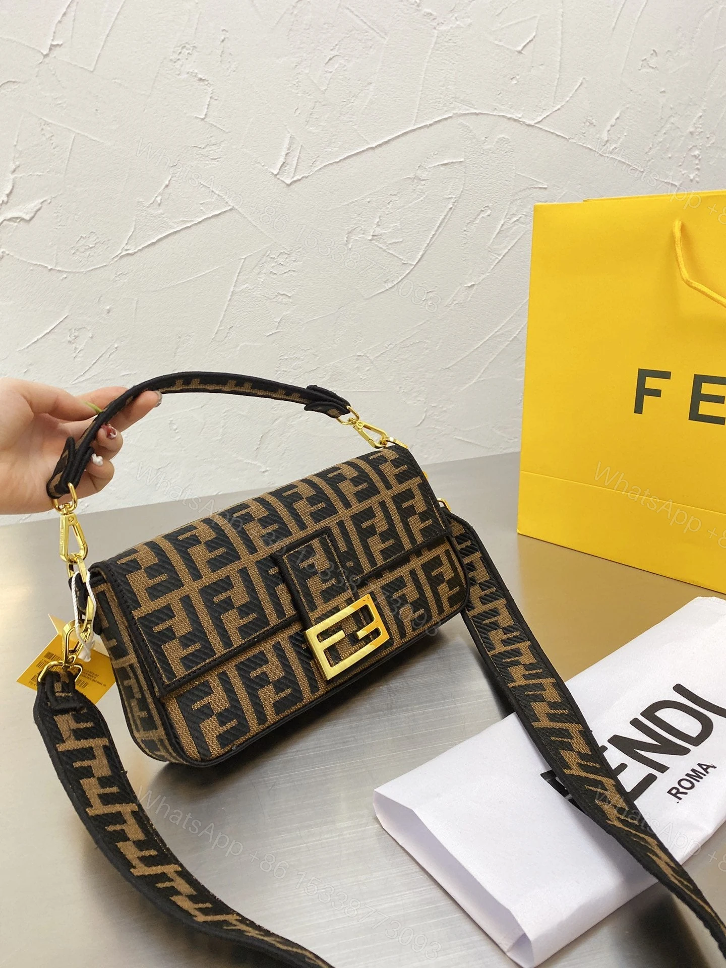 View 4 of Fendi Baguette Bag Aus Canvas In Braun