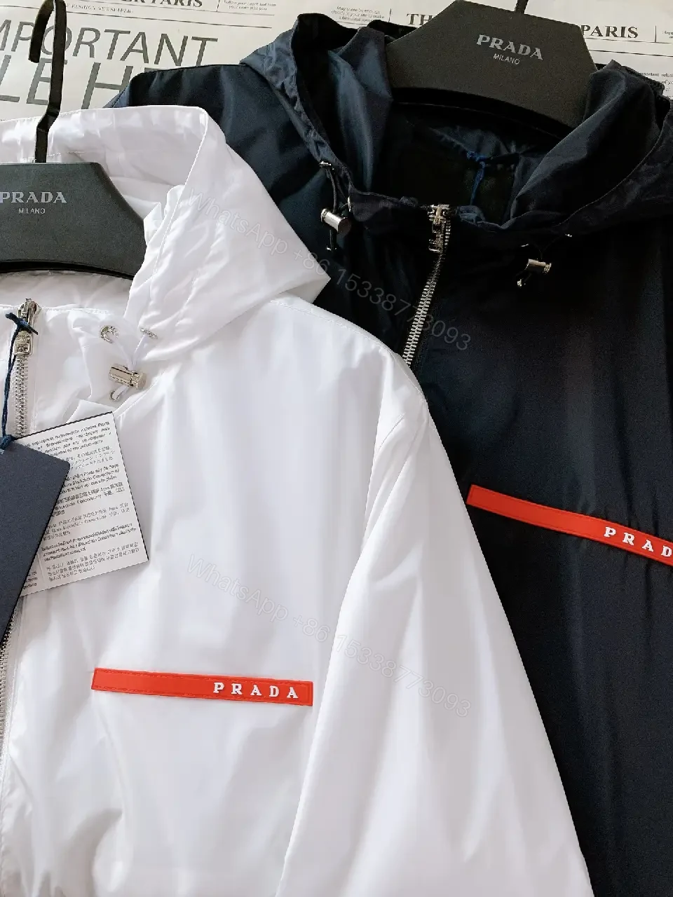 View 9 of White Nylon Windbreaker with Red Accent — Lightweight, Weather-Ready Outerwear