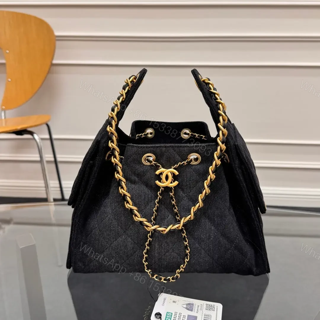 CHANEL 25 Small IN BLACK-GRAY DENIM WITH GOLD HARDWARE — view 1