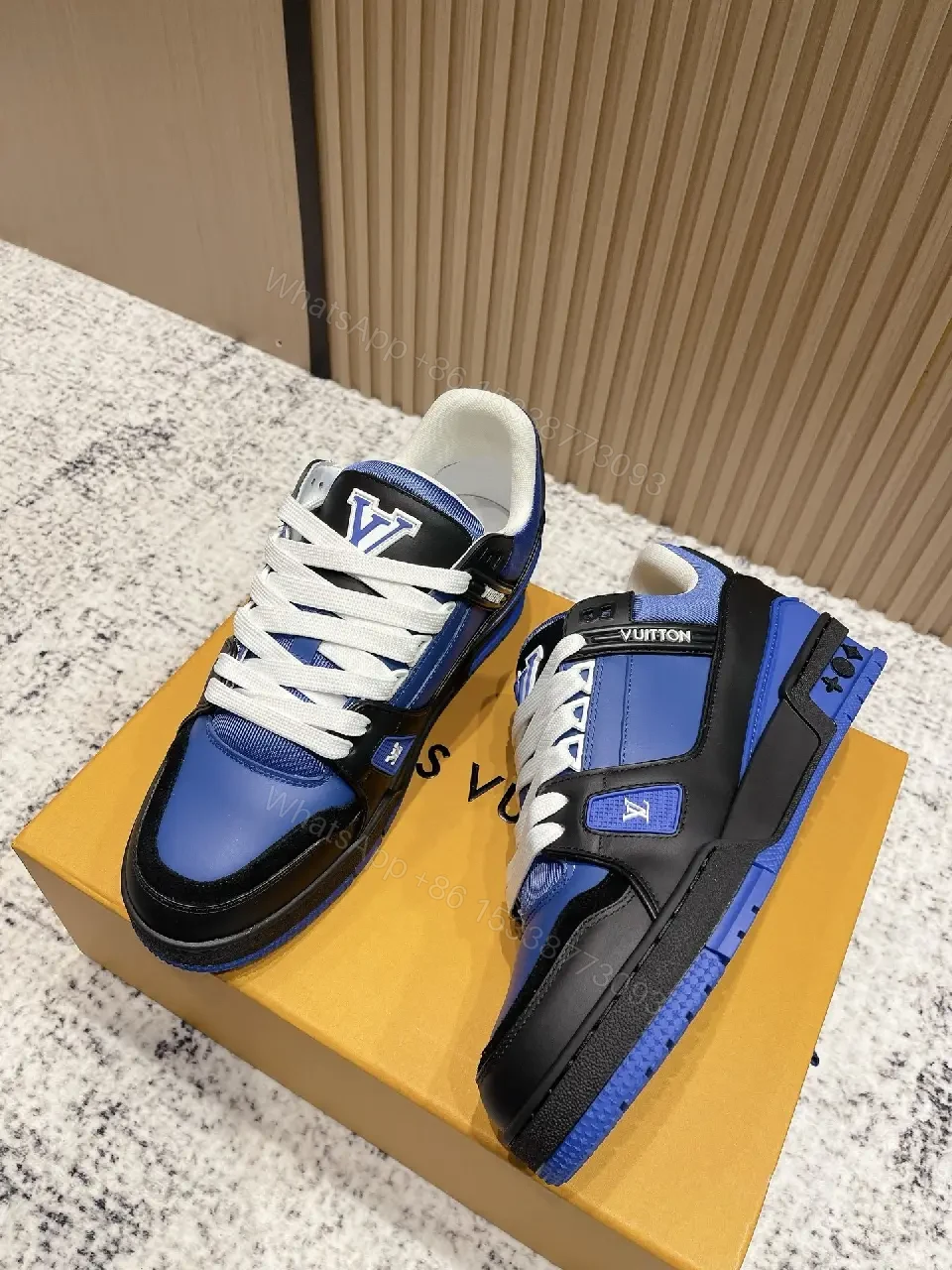 View 6 of Textured Blue-Black Leather High-Tops with Bold Detailing