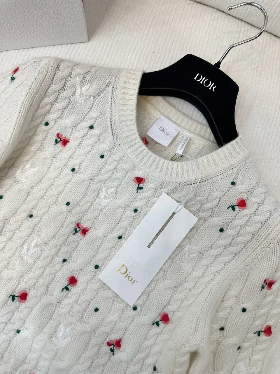 View 8 of White Cable-Knit Floral Knitwear: Subtle Luxury, Everyday Comfort
