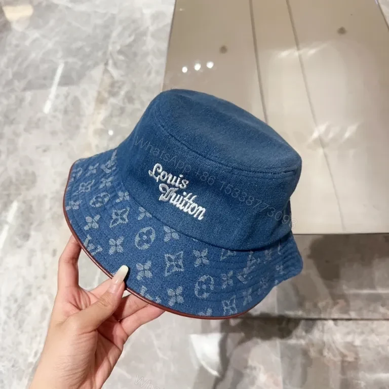 View 2 of Denim Bucket Hat with LV Monogram Accents - Modern Texture