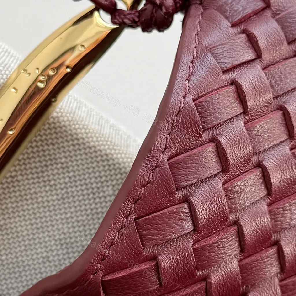 View 9 of Textured Plum Mini Bag: Handwoven Leather, Luxe Compact