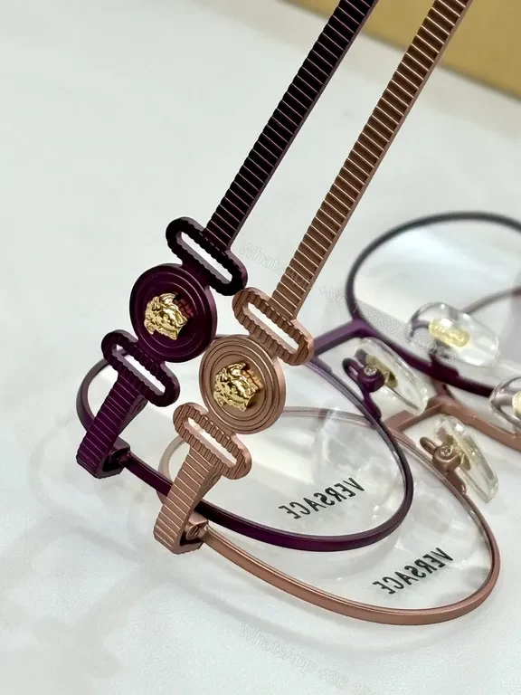 View 4 of Refined Round Eyewear: Luxury Metal Frames with Signature Detail