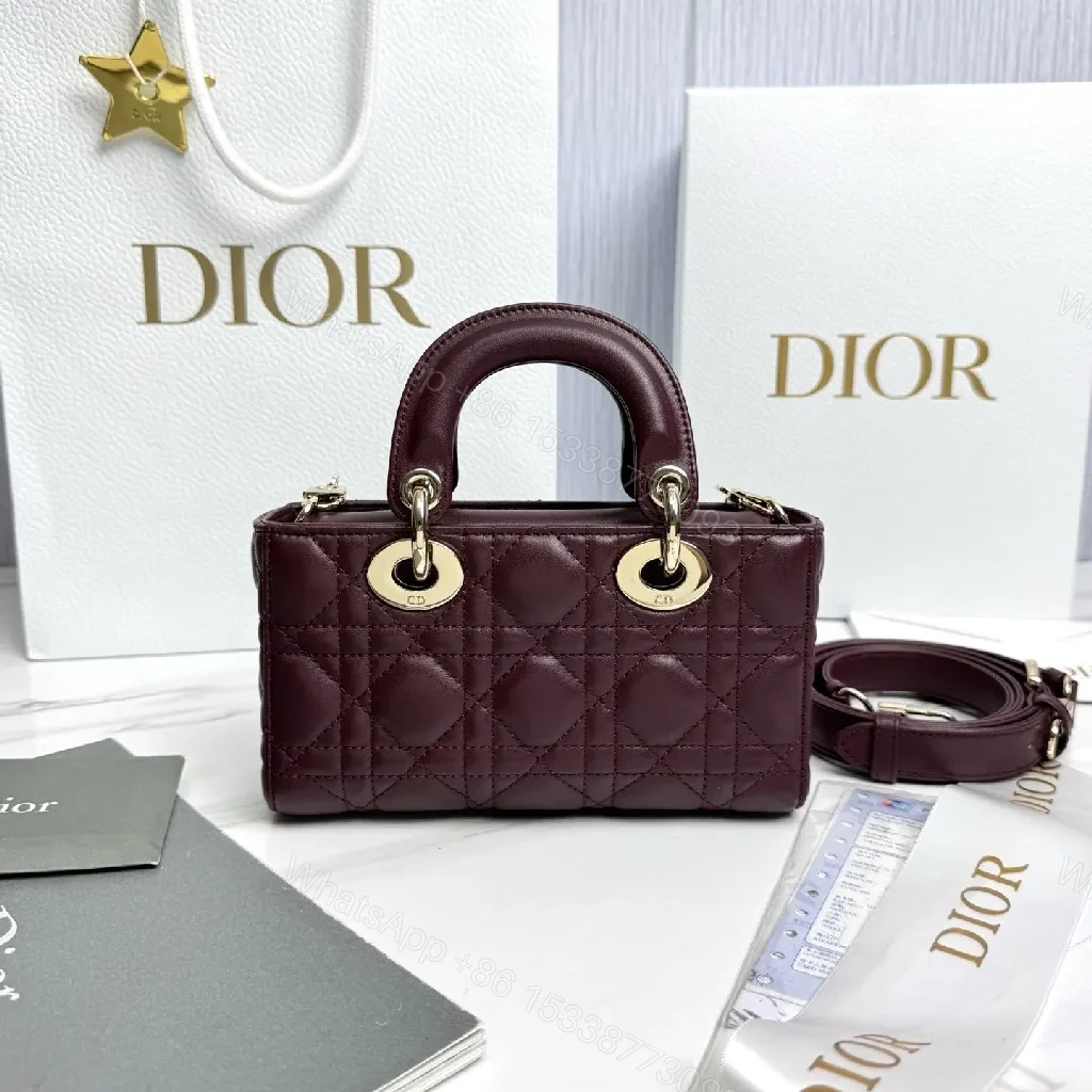 View 6 of Quilted Burgundy Calfskin Top-Handle Bag with Gold Accents