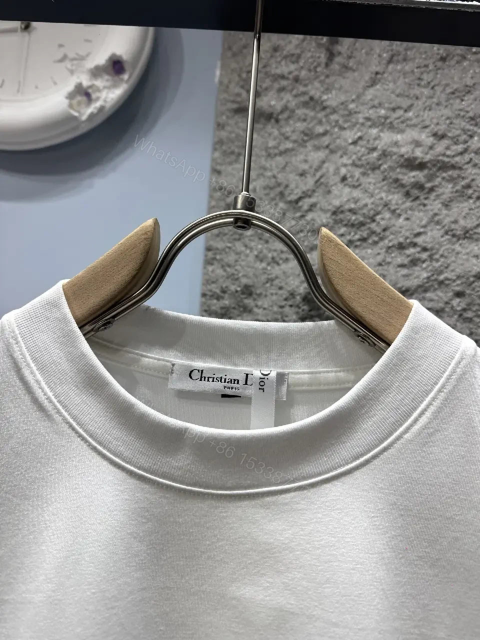 View 3 of White Cotton Crewneck Tee - Subtle Designer Crest, Everyday Luxury