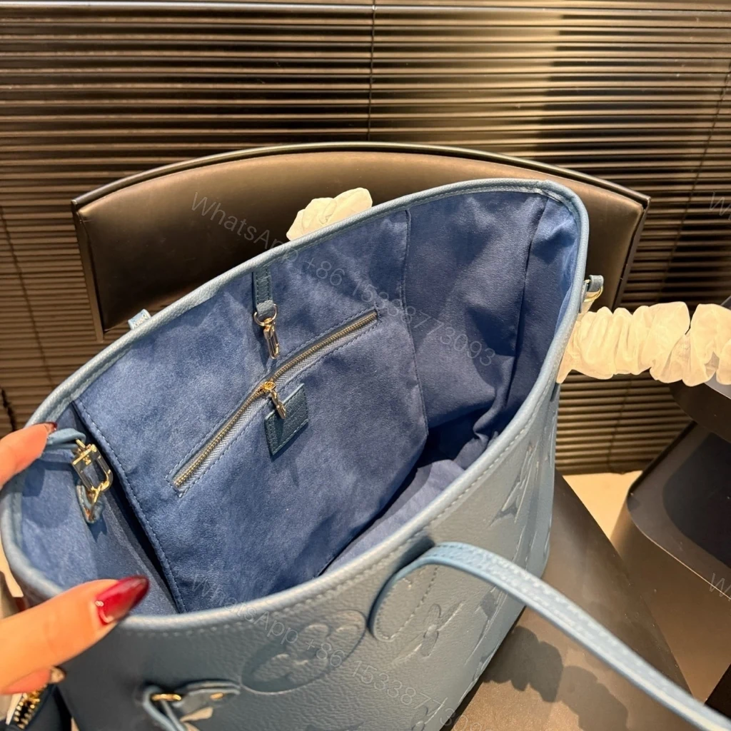View 3 of Louis Vuitton Neverfull MM Tote Bag Monogram Empreinte Bleu Jean 31cm M27358