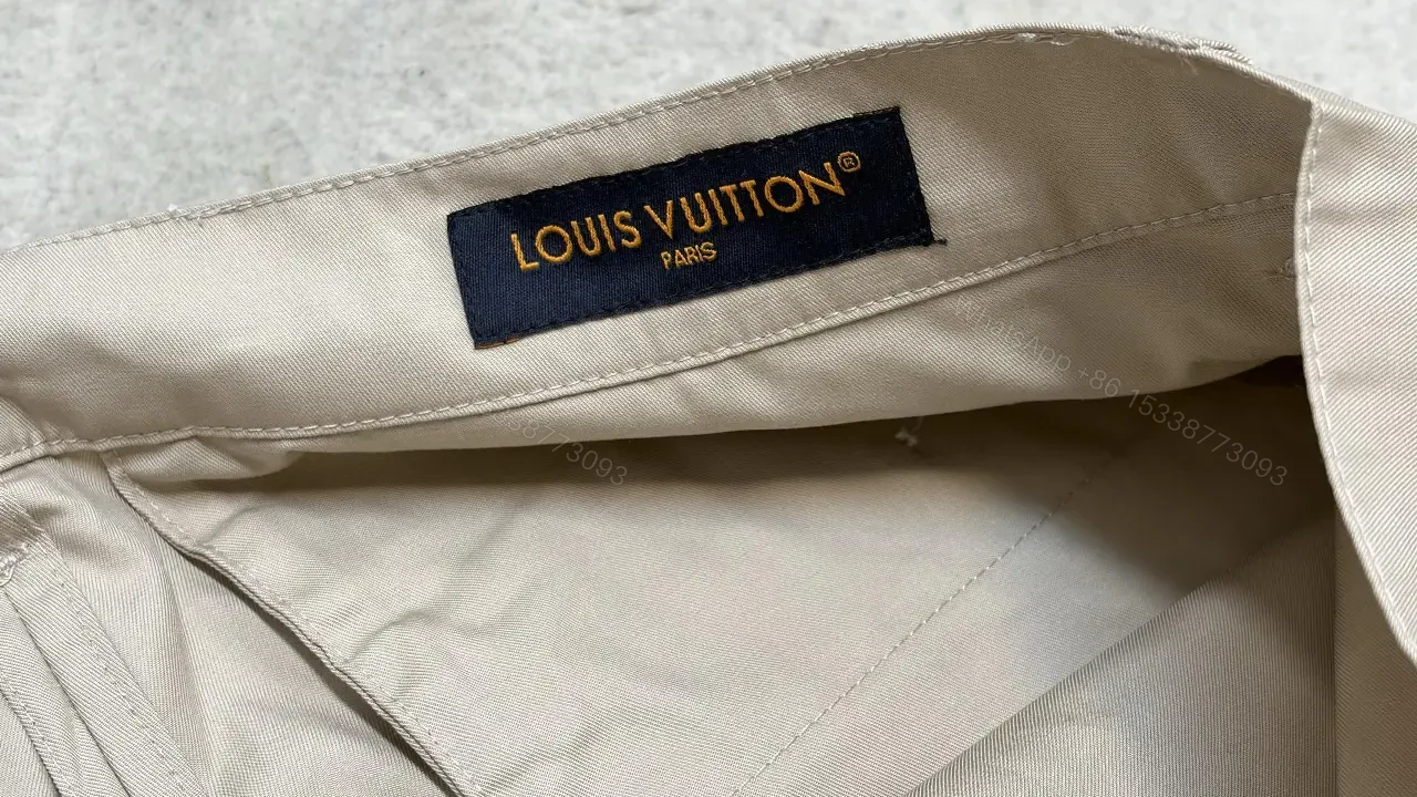 View 5 of Beige Nylon Cargo Shorts with Louis Vuitton Tag