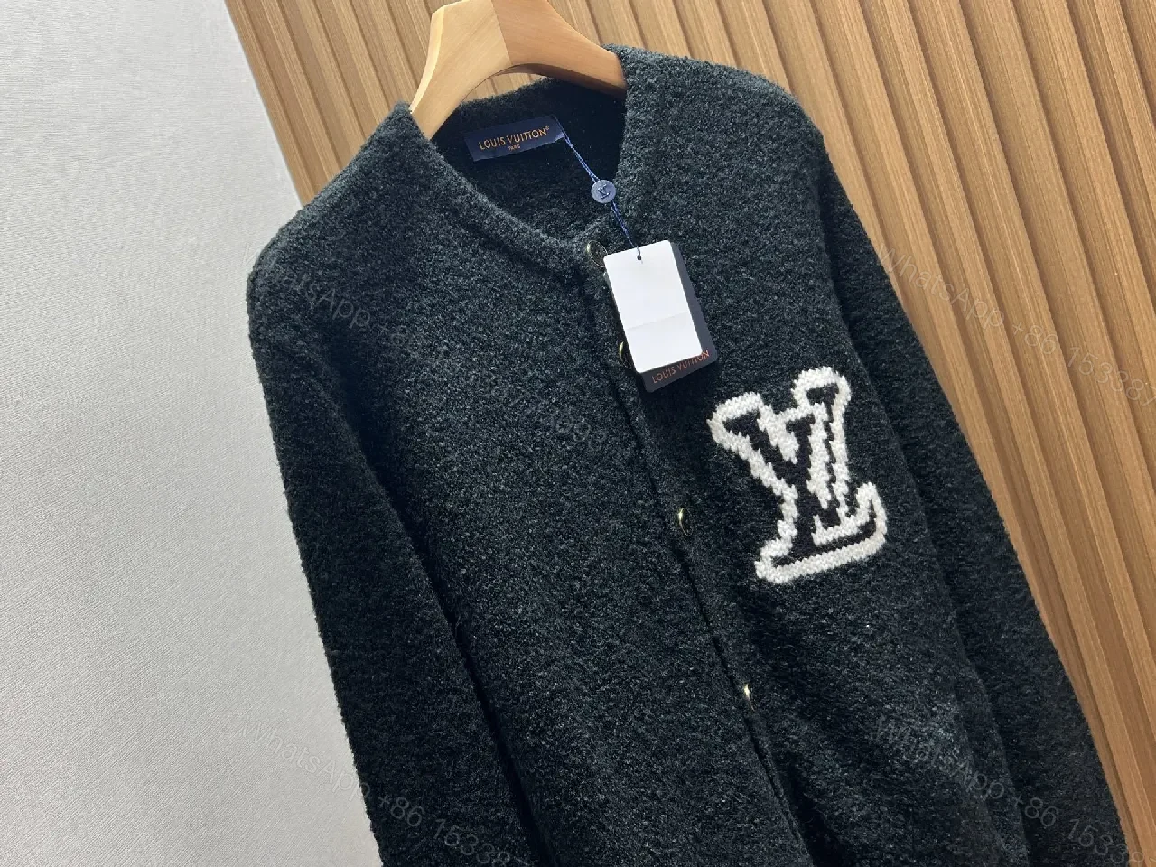 View 7 of Black Boucle Cardigan | Luxe Texture + Signature Logo + Cozy Warmth