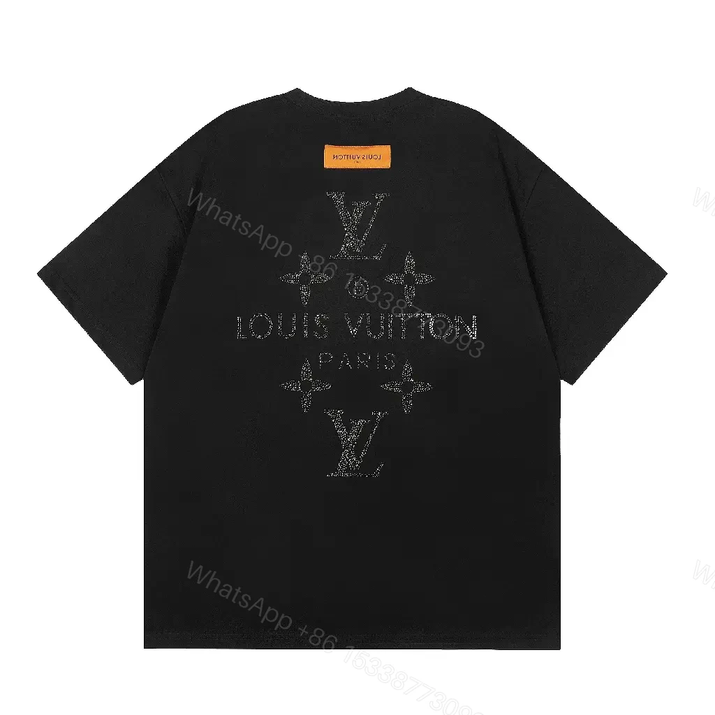View 7 of Minimalist Black Cotton Tee with Subtle Monogram Detail - Everyday Luxury
