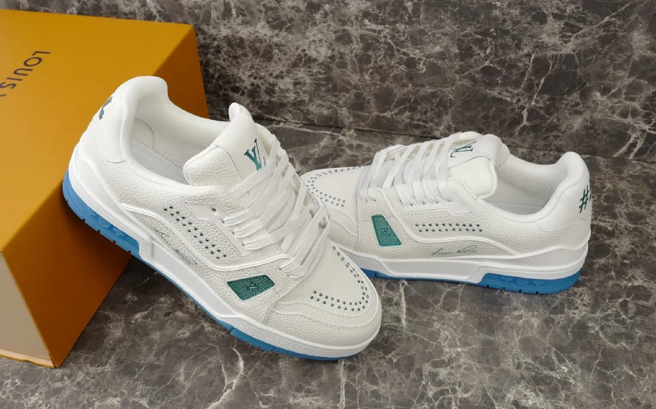 View 6 of White Leather Luxury Sneakers with Subtle LV Accents