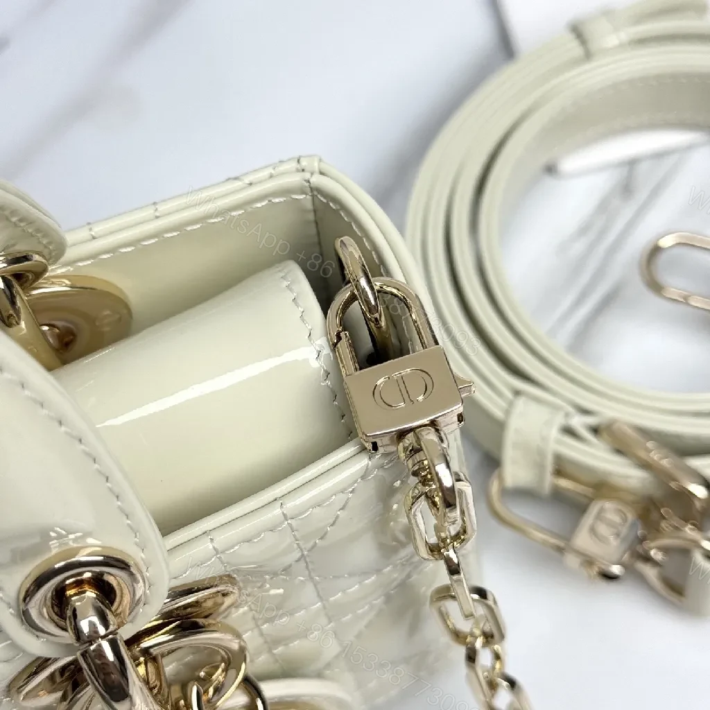 View 2 of Ivory Faux-Leather Mini Bag: Quilted, Gold-Accent Luxury