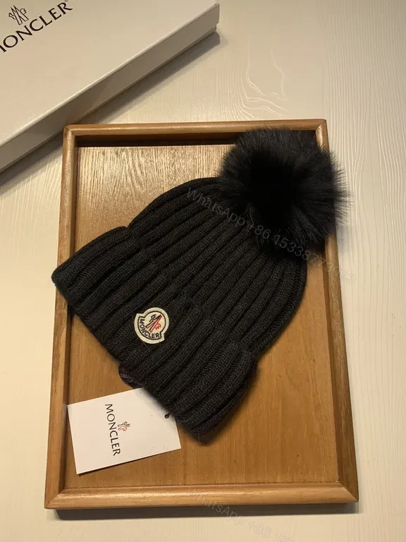 View 4 of Moncler Wool-Blend Beanie with Faux-Fur Pom, Black, Luxury Style