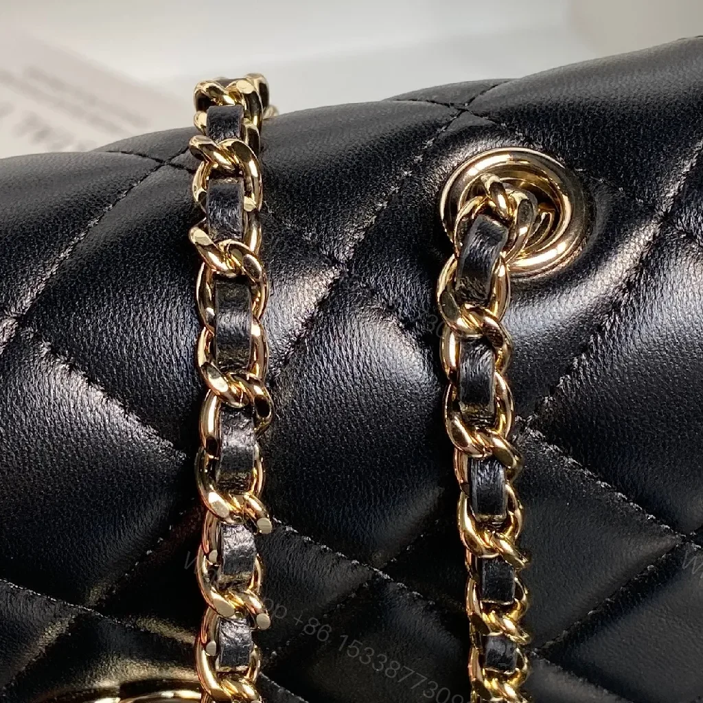 View 6 of Quilted Black Flap Bag with Gold Chain Strap, Compact, Elegant