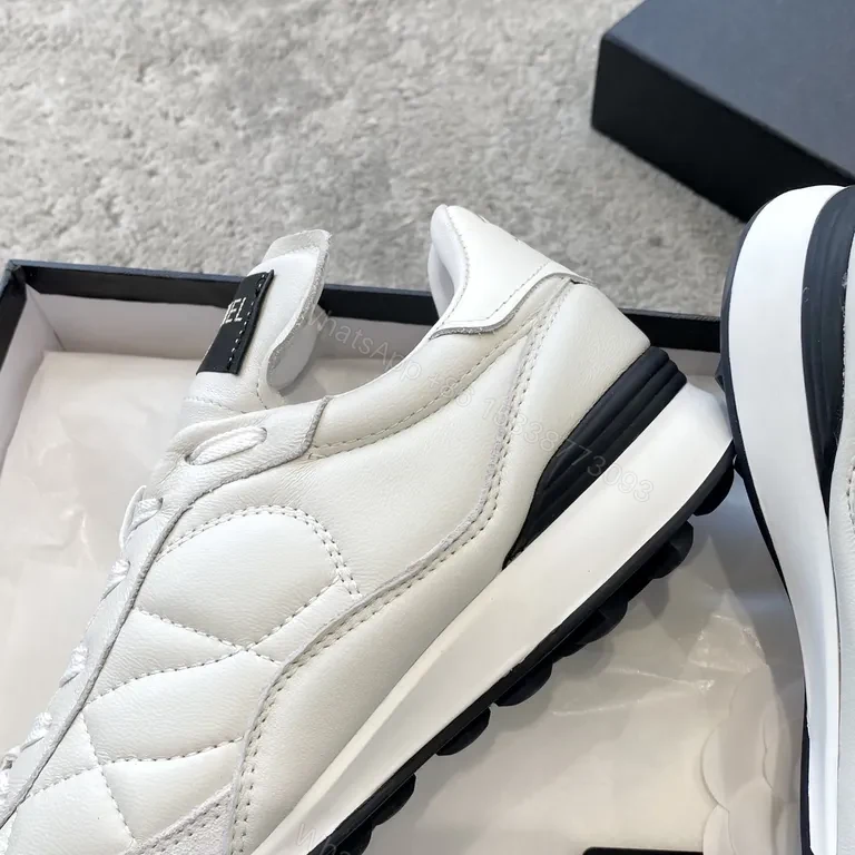 View 5 of Chanel Quilted High-Top Sneakers â€“ Luxe Comfort Urban Style
