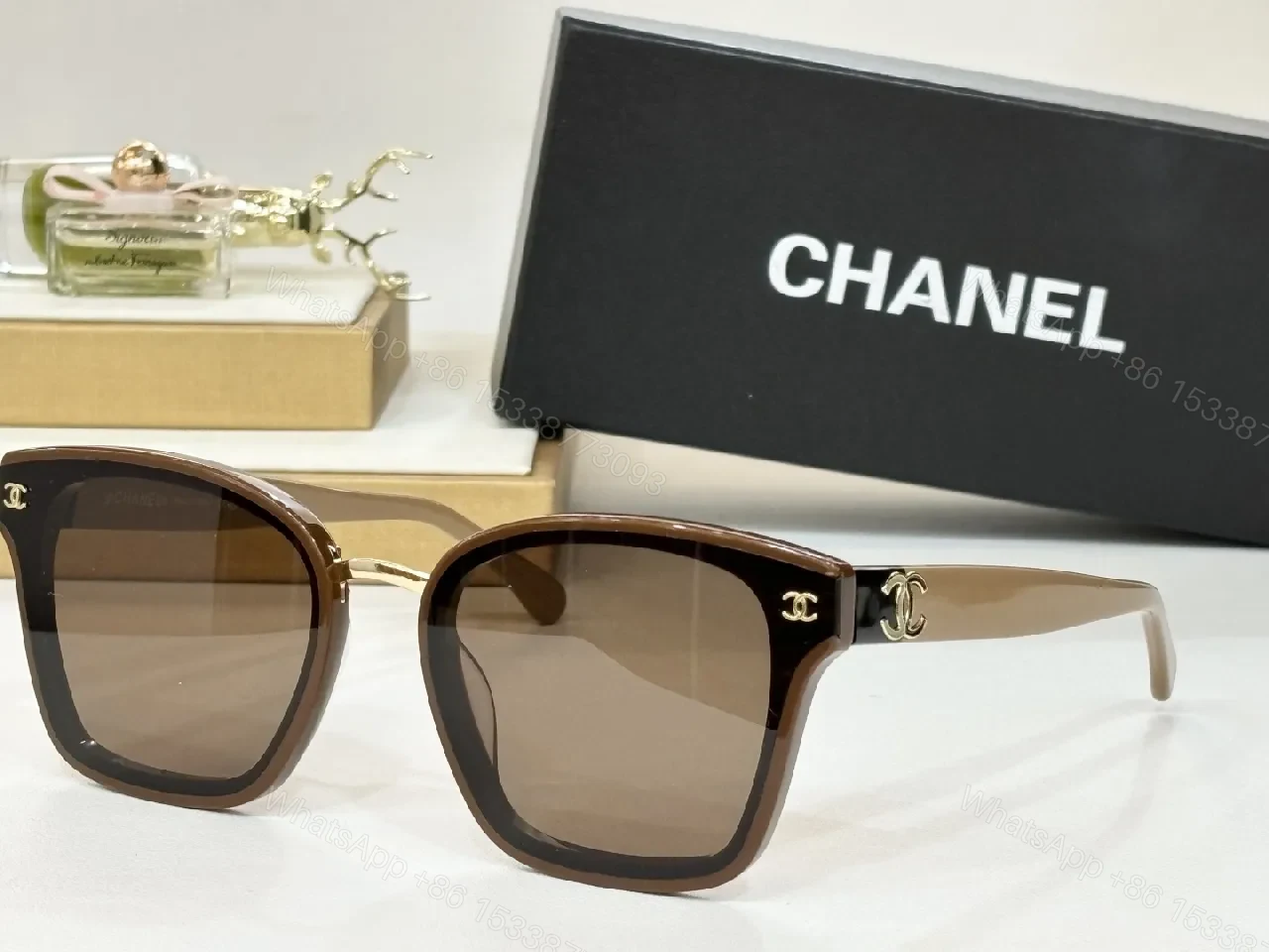 Brown Luxury Sunglasses with Gold Detailing - Effortless Chic Eyewear — view 1