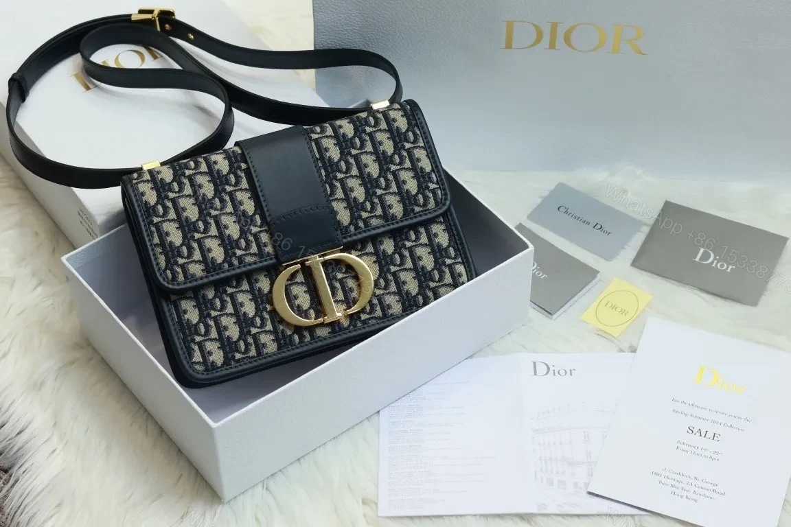Crossbody Bag: Monogram Pattern, Black Leather, Compact, Gold Clasp — view 1