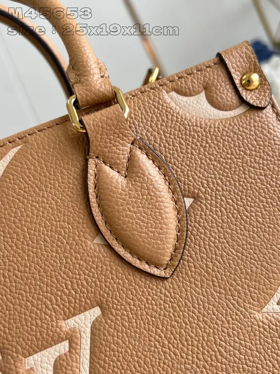View 2 of Chic Monogram Satchel: Everyday Luxury Tote with Strukturized Carry