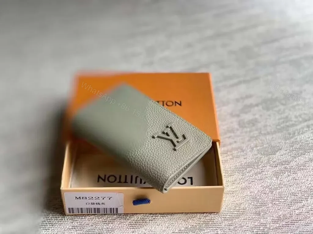 View 4 of Sage-Grain LV Card Holder: Subtle Signature, Slim Portability