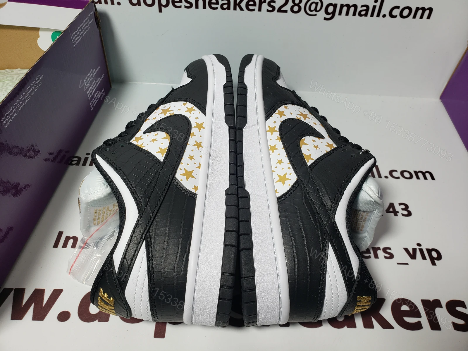 View 3 of Supreme x Nike SB Dunk Low Black Stars DH3228-102