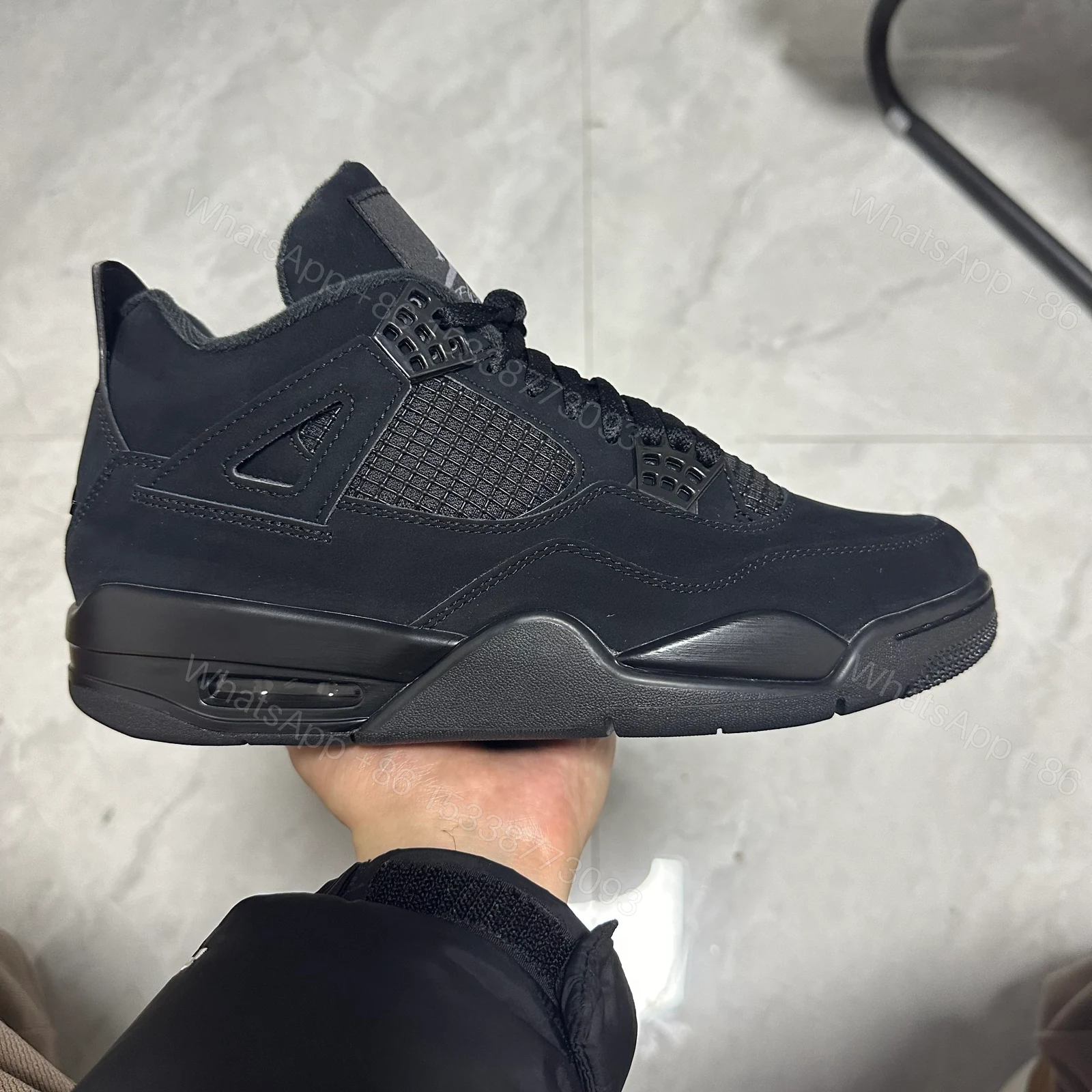 Jordan 4 Retro Black Cat (2020) — view 1