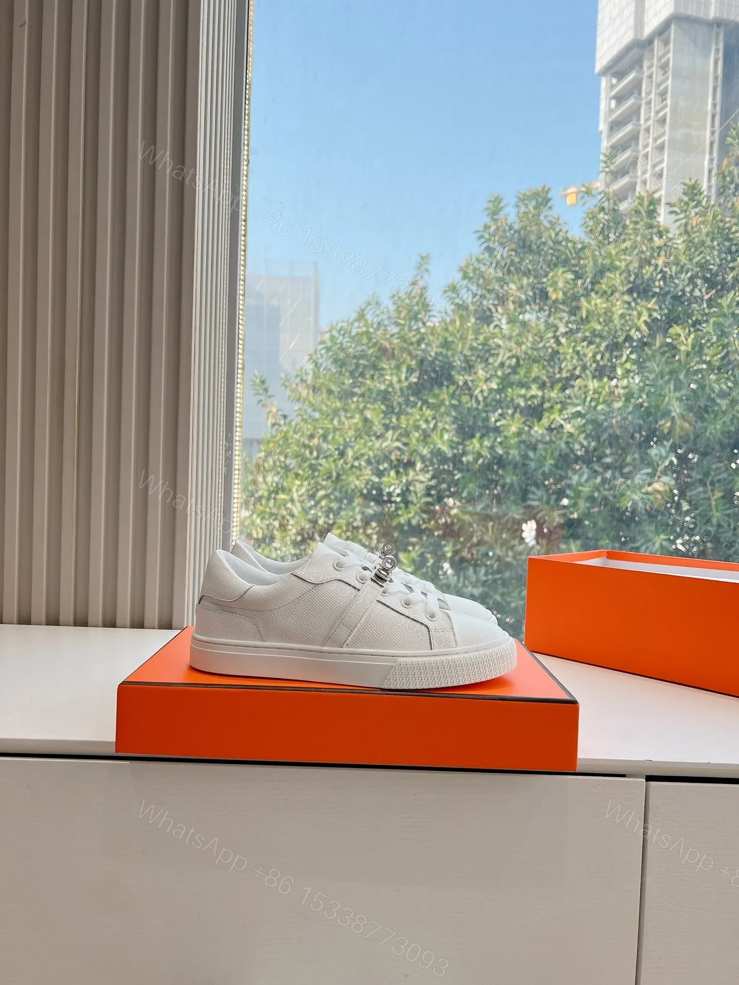 View 2 of Hermes Women White Leather Sneakers