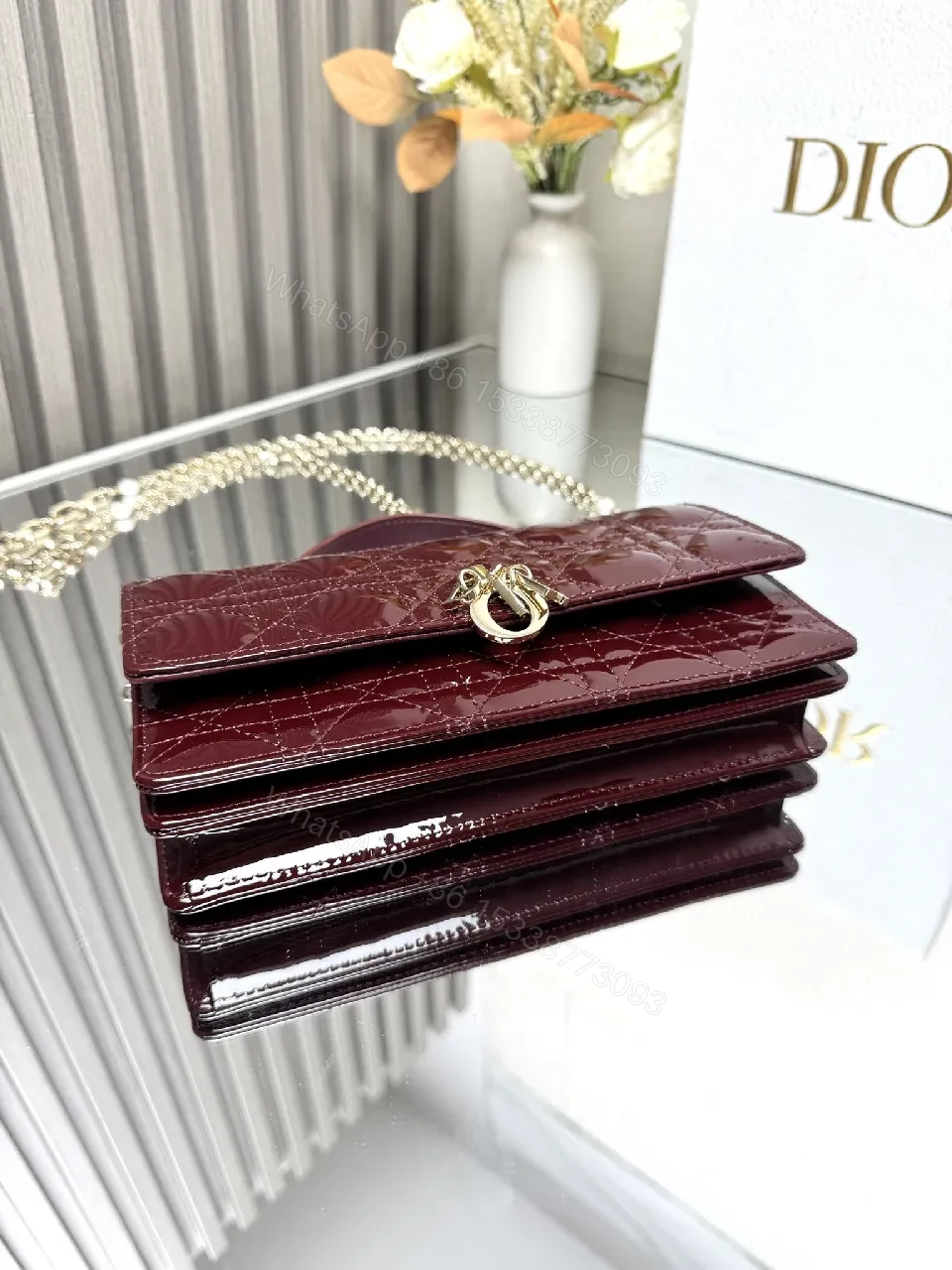 View 9 of Burgundy Patent Leather Clutch: Geometric Quilted Luxury