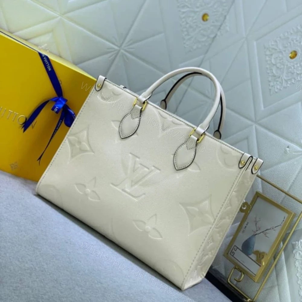 View 3 of Louis Vuitton Onthego MM Monogram Empreinte Beige 35Cm