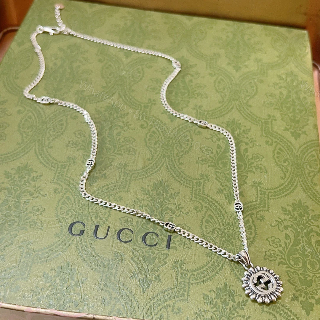 Gucci高仿男女款太陽花吊墜銀項鍊 復刻GG標誌設計感十足 — view 1