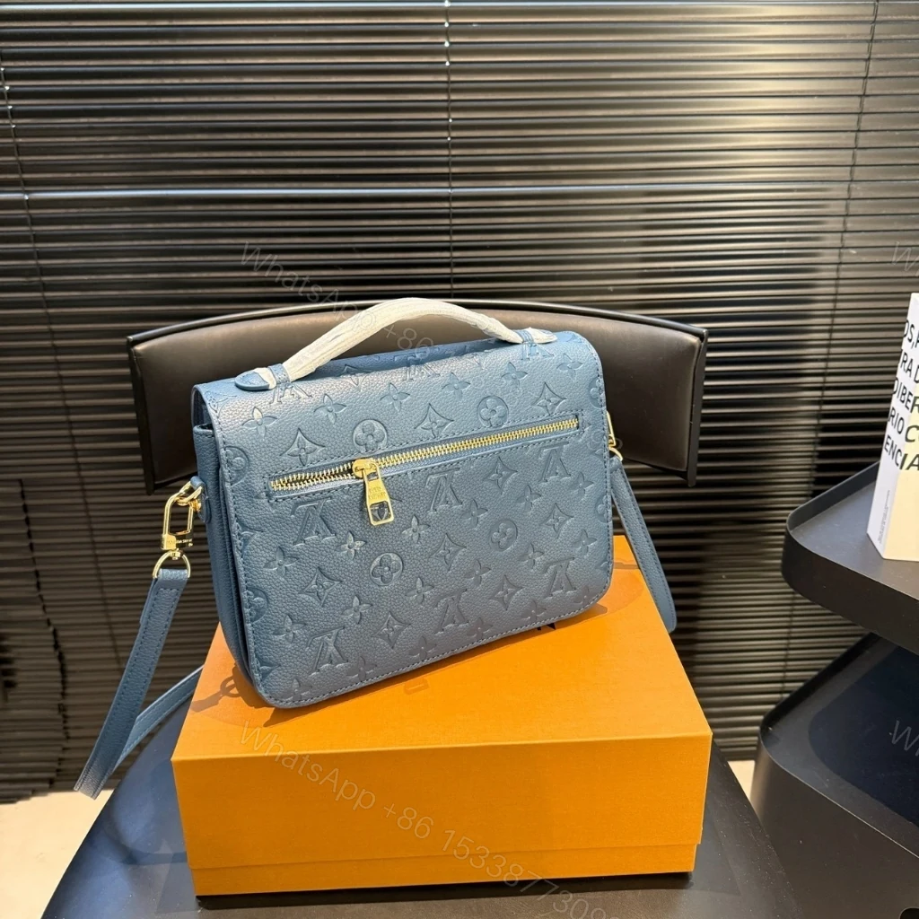 View 6 of Louis Vuitton Pochette Métis Monogram Empreinte Bleu Jean 25cm M27357