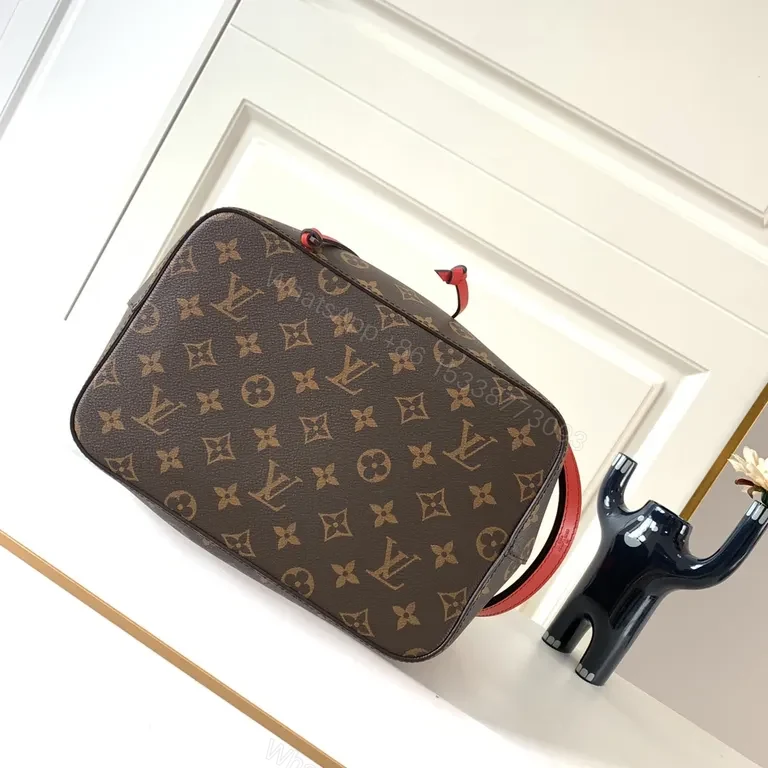 View 2 of Louis Vuitton-Style Monogram Bucket Bag: Red Leather Drawstring, Tote-like Versatility
