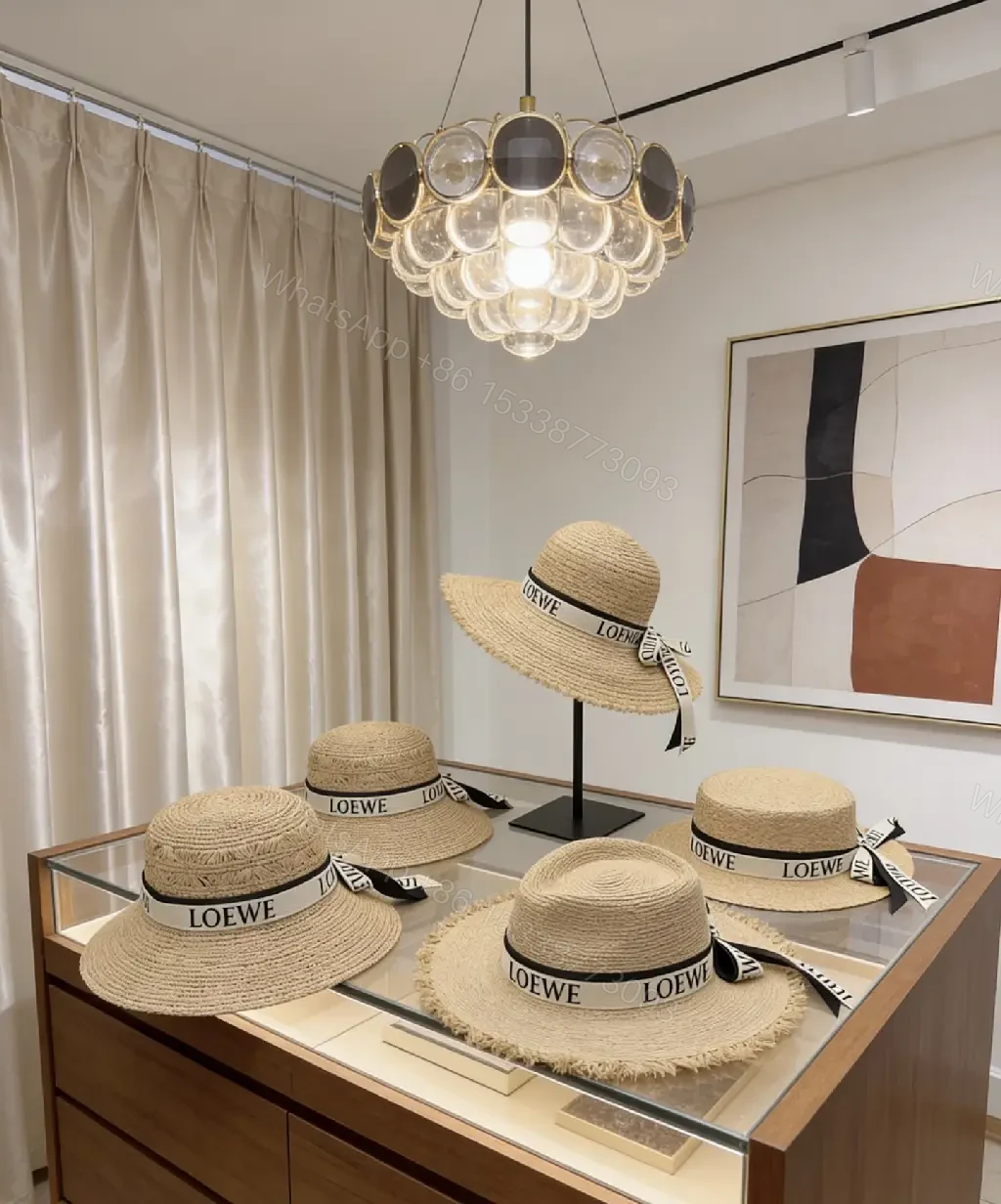 View 4 of Light Beige Straw Boater Hat with Ribbon Bow - LOEWE Style