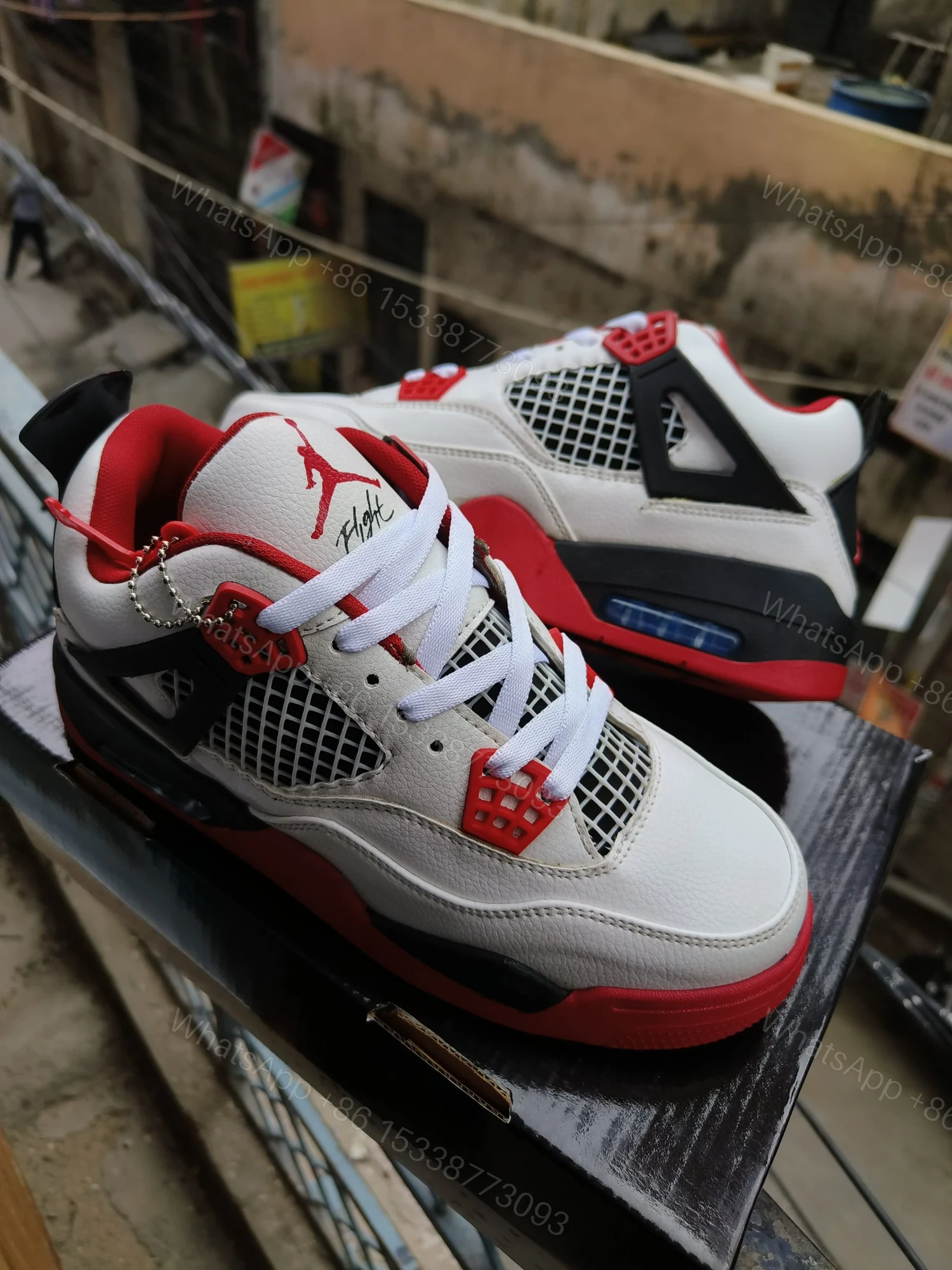 View 6 of BUY FIRST COPY NIKE JORDAN 4 “RED/WHITE” SNEAKERS