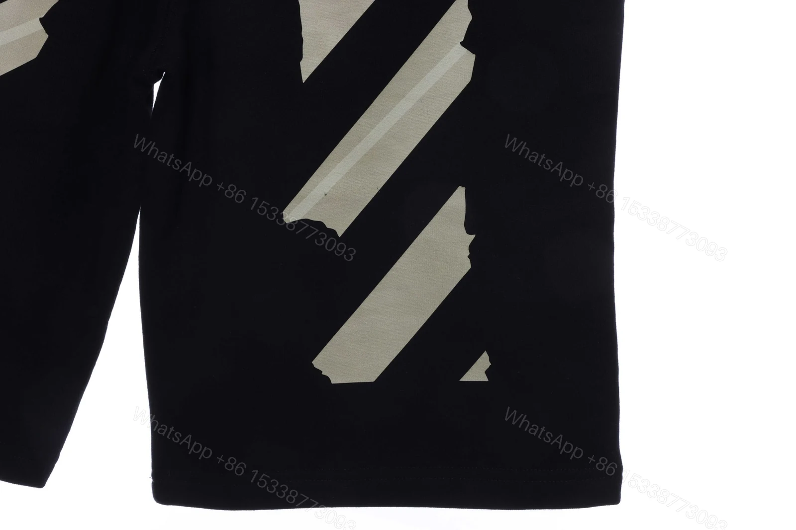 View 3 of Off-White Rubber Strip Printed Shorts