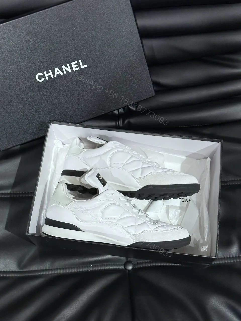 View 2 of White Quilted Low-Top Sneakers with Chanel-Inspired Detail
