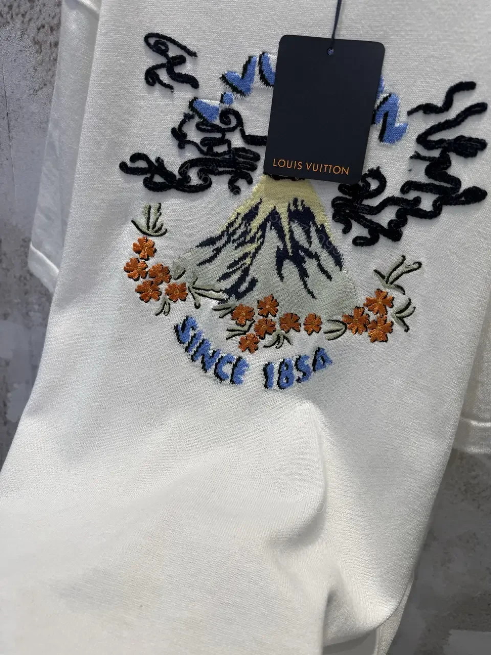 View 2 of White Embroidered Graphic Tee with Luxe Motif - Casual Luxury Top