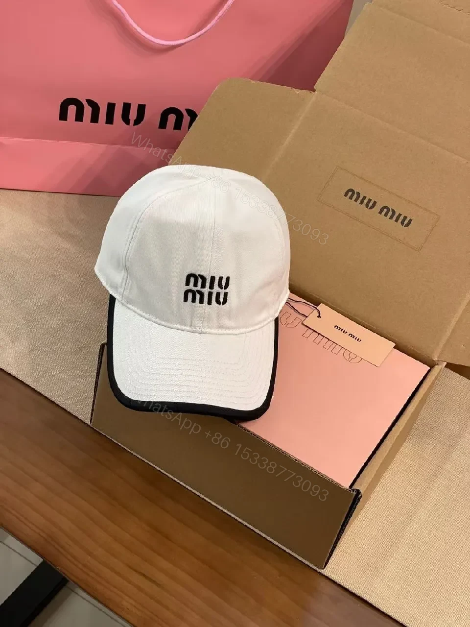 View 5 of White Cotton Cap | Structured Six-Panel, Logo Detail, Adjustable Fit